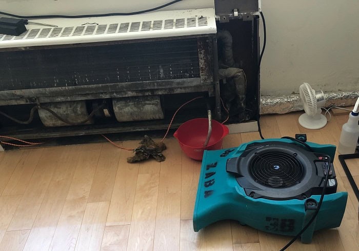 AC leak water damage chicago