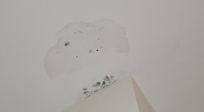 ceiling water damage from AC unit above