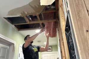 water damage restoration due to fridge water line leaking albany park