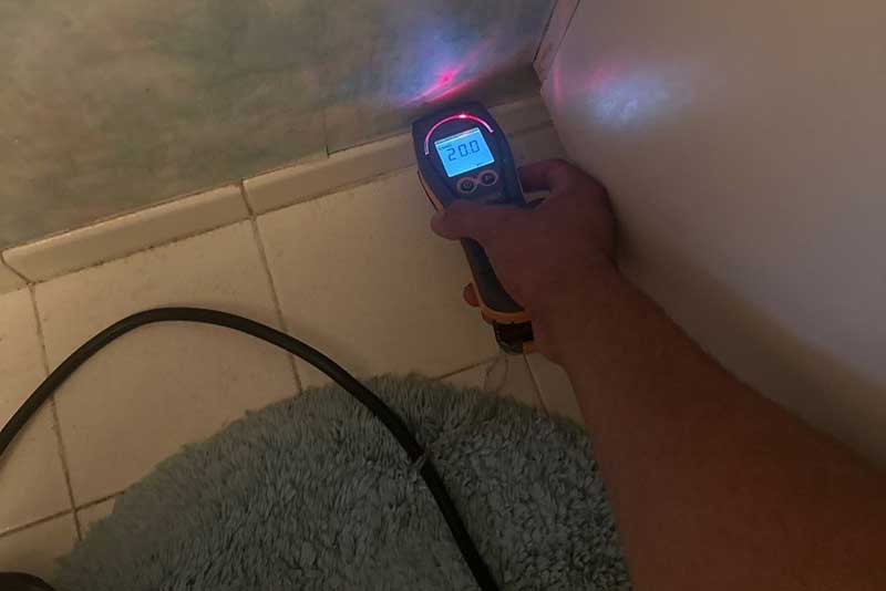 Testing Wall Moisture with a Digital Meter