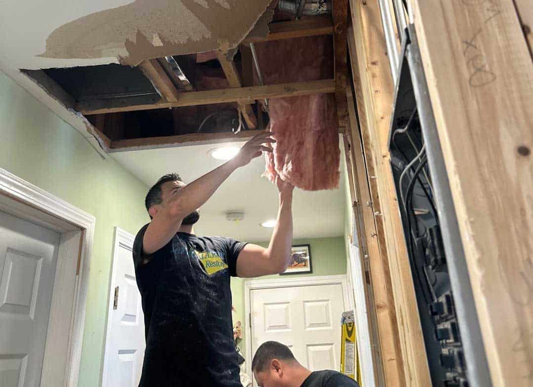 flooded laundry room in chicago water damage restoration service